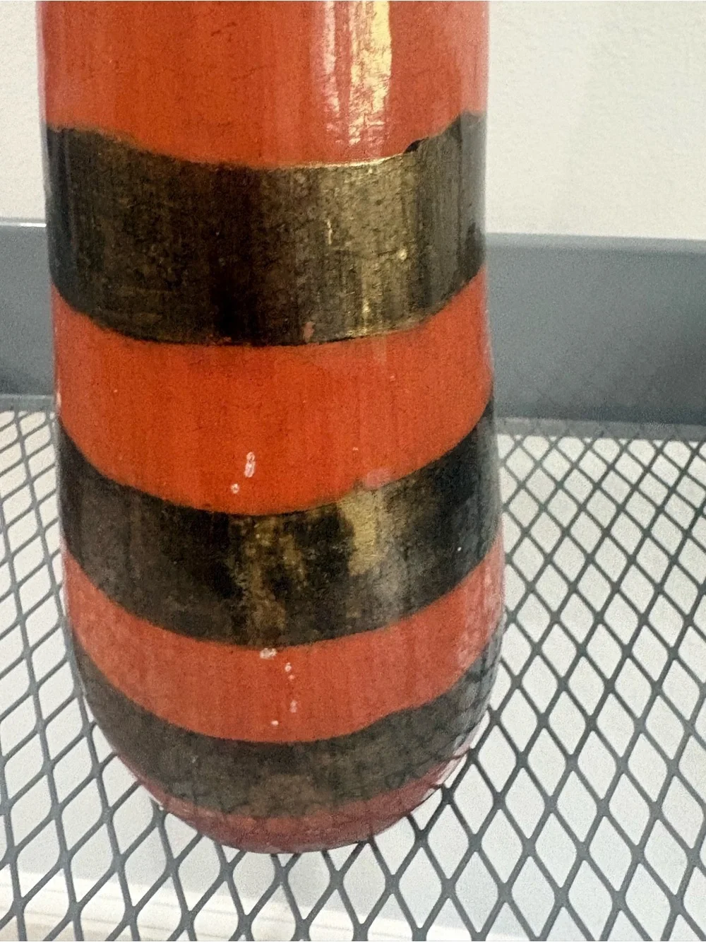 Orange and gold striped vase unbranded with crazing issues
